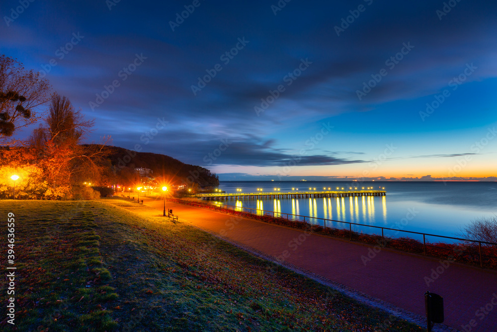 Beautiful landscape with wooden pier in Gdynia Orlowo before sunrise, Poland