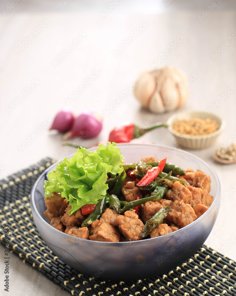 Tempe Orek or Stir Fried Tempeh, Indonesian Traditional Cuisine Made from Tempeh with Soy Sauce or Palm Sugar Added. Sometimes Add Chilli to make It Spicy