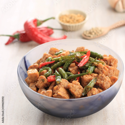 Tempe Orek or Stir Fried Tempeh, Indonesian Traditional Cuisine Made from Tempeh with Soy Sauce or Palm Sugar Added. Sometimes Add Chilli to make It Spicy