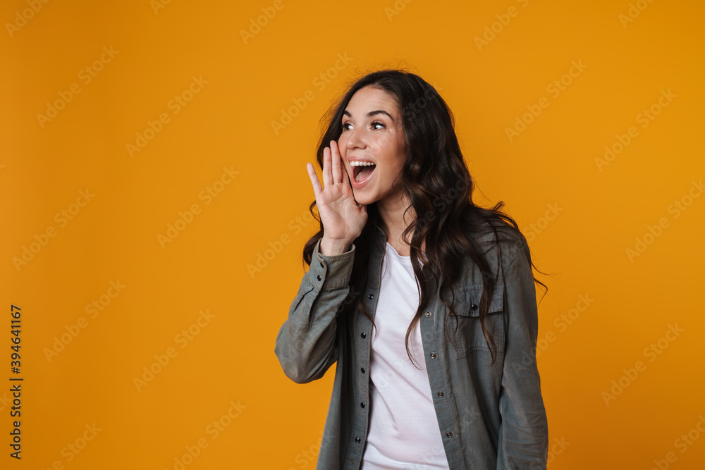 Joyful beautiful girl looking and screaming aside Joyful beautiful girl looking and screaming aside