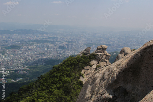 City view from the high mountain. One-day hiking in megapolice