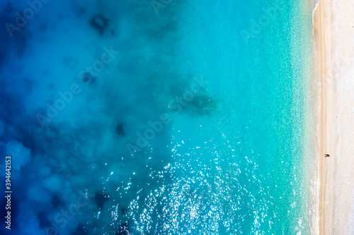 Top view of the turquoise and blue colored sea of the popular Myrtos beach on the island of Kefalonia, Greece, without people