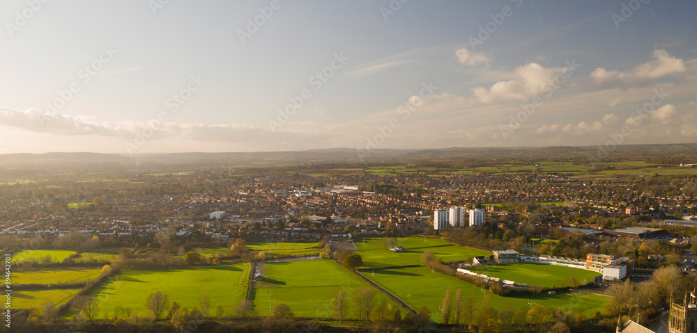 Farmland sat centre with buildings flowing around it