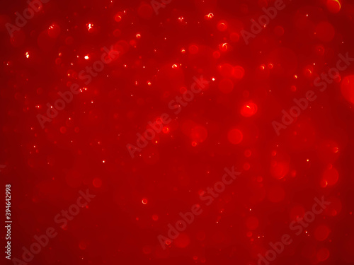 Christmas background red.Red color abstract background with soft blur bokeh light effect.
