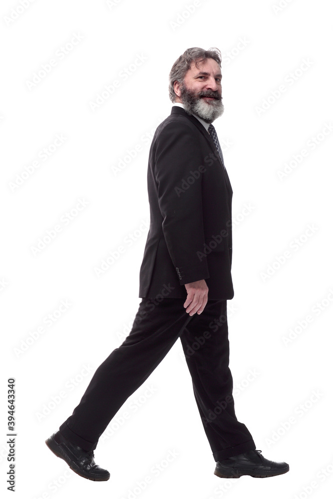 cheerful bearded man striding forward. isolated on a white cheerful bearded man striding forward. isolated on a white
