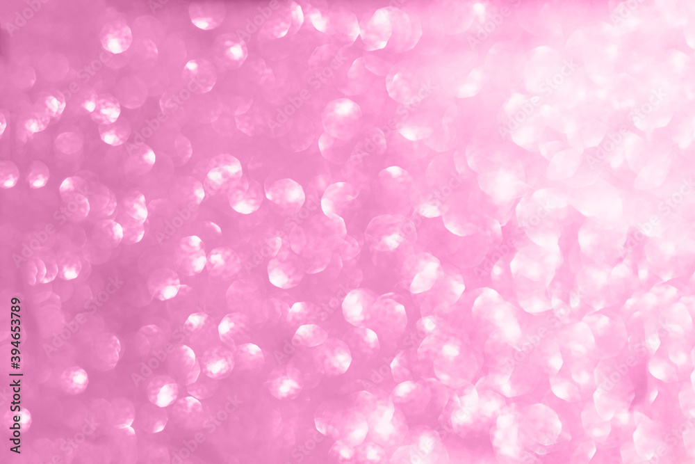 Abstract blurred pink sparkle bakground.