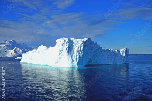 This iceberg floats on the sea. Some parts of the iceberg are too bright in the sun.  © twabian
