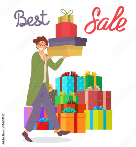 Smiling man with gift boxes in his hands. Young handsome fashion shopper guy with big presents on the background. Holliday sale and shopping concept. Male character in store preparing for the holiday