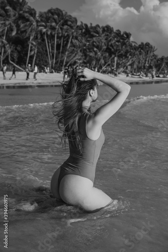 women on the beach in the tropics, in the Philippines photo