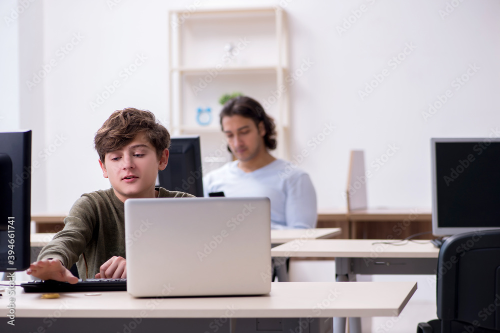 Father and son in criptocurrency concept Father and son in criptocurrency concept