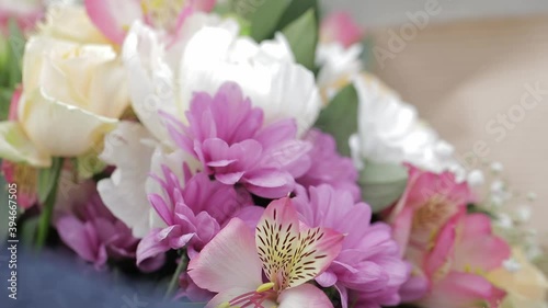 florist collects a magnificent bouquet of flowers for the holiday