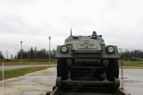 Child on railway armored personnel carrier