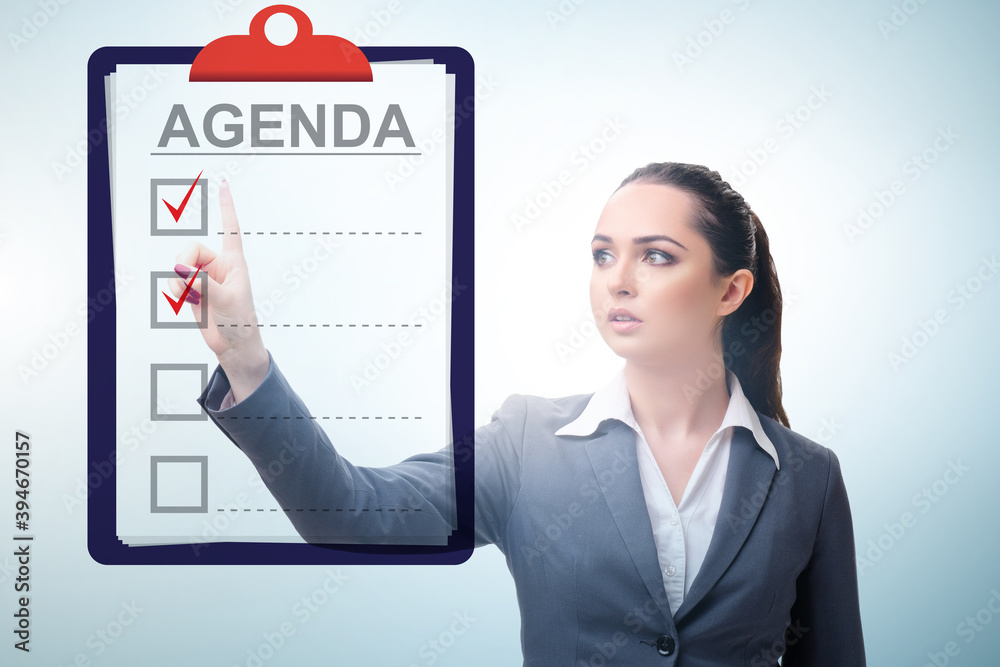 Businesswoman preparing the agenda for meeting Businesswoman preparing the agenda for meeting