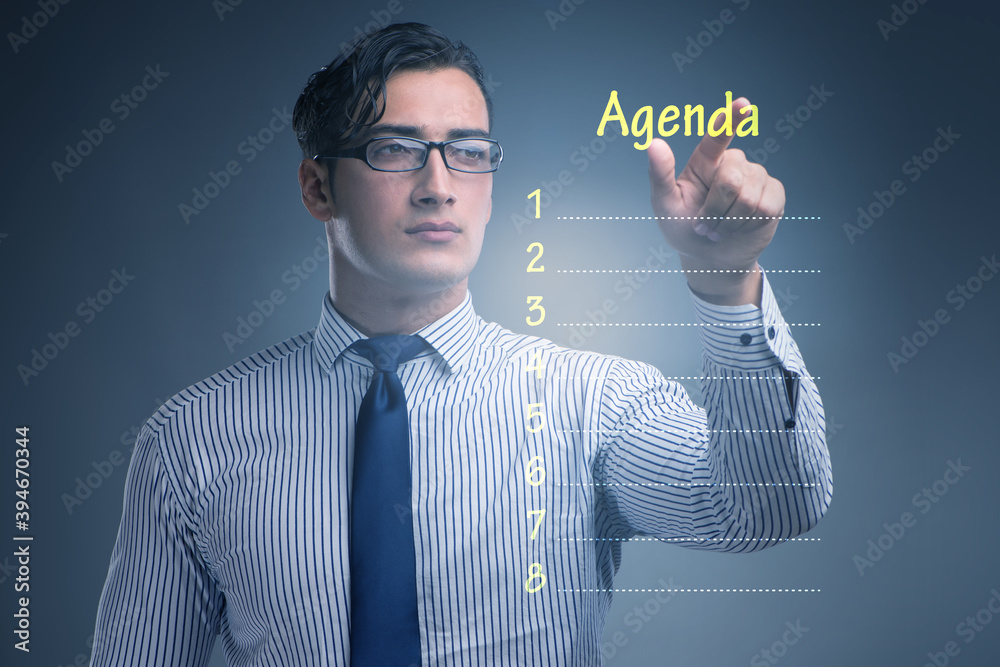 Businessman preparing the agenda for meeting Businessman preparing the agenda for meeting