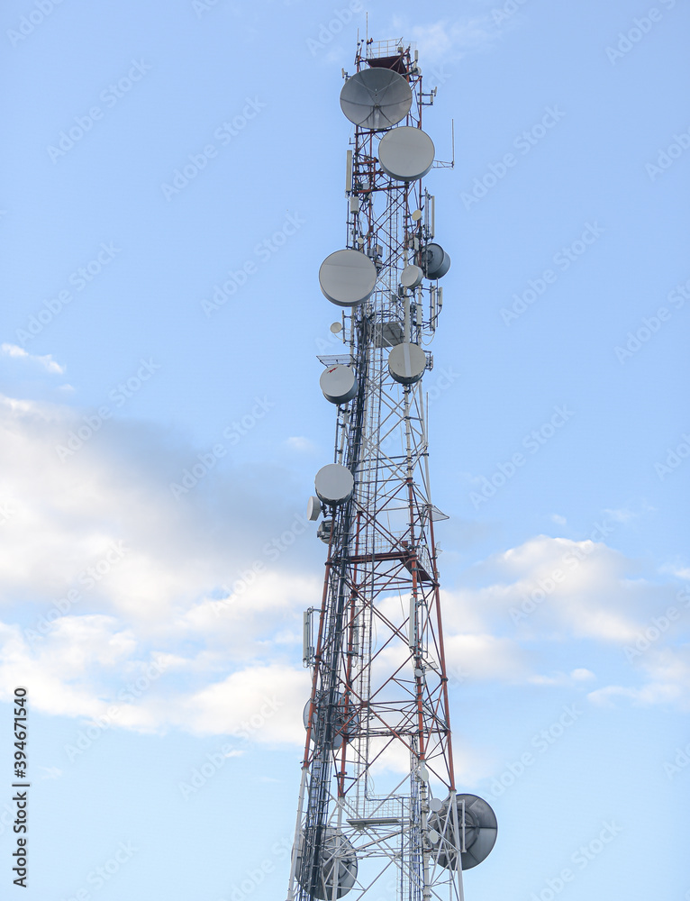 scaffolding with antennas on a blue background scaffolding with antennas on a blue background