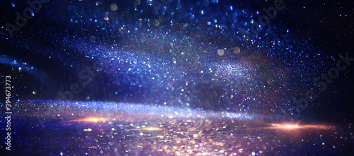 background of abstract glitter lights. Purple, silver, blue and black. de focused © tomertu