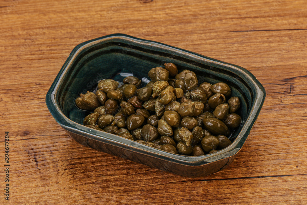 Tasty capers in the bowl Tasty capers in the bowl