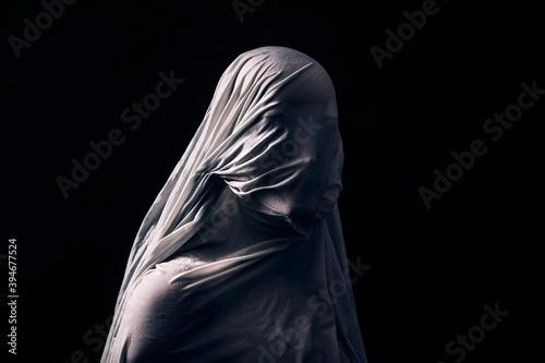 Portrait of a scary ghost isolated on black background