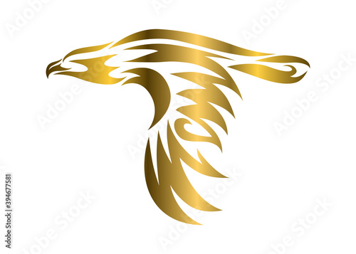 Golden vector symbol of eagle that is flying.