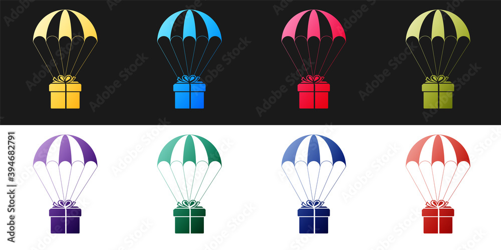Set Gift box flying on parachute icon isolated on black and white background. Delivery service, air shipping concept, bonus concept. Vector.