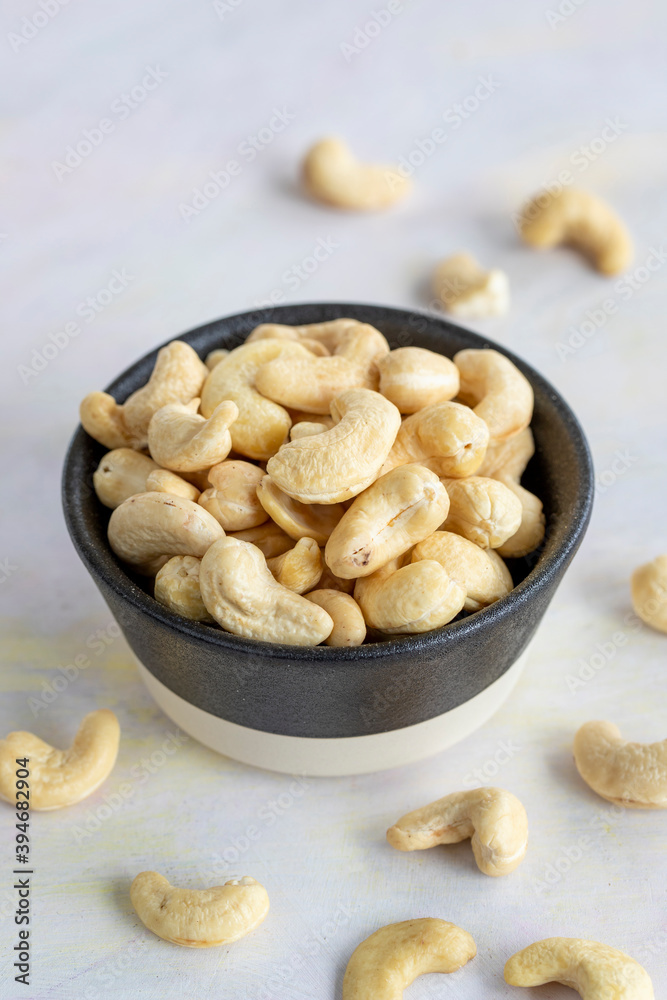 cashew on wooden background - kaju cashew on wooden background - kaju