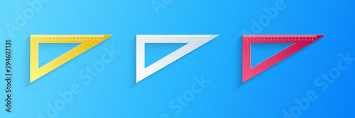 Paper cut Triangular ruler icon isolated on blue background. Straightedge symbol. Geometric symbol. Paper art style. Vector.