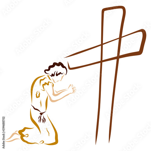 Fototapeta tired man in tattered clothes prays humbly at the cross