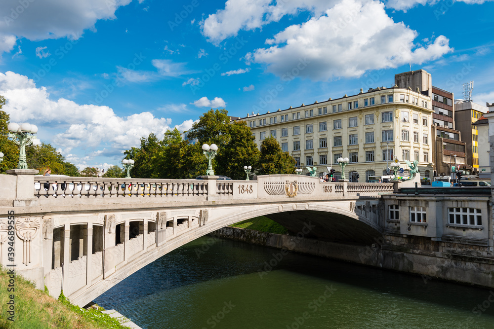 The dragon bridge over the Ljubljanica river in Ljubljana on sunny day