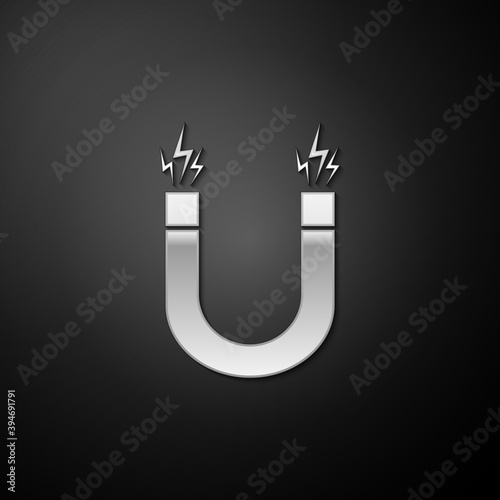 Silver Magnet icon isolated on black background. Horseshoe magnet, magnetism, magnetize, attraction. Long shadow style. Vector.