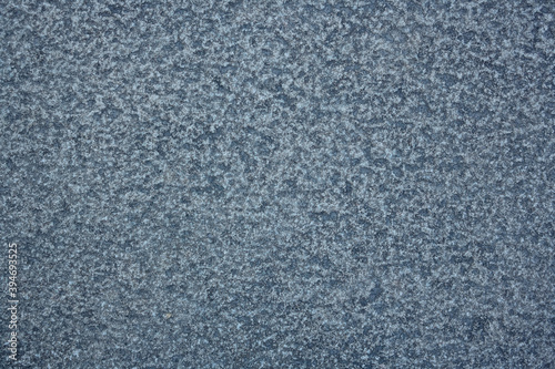 Gray surface of a polymer sheet of iron. Empty abstract metal background.