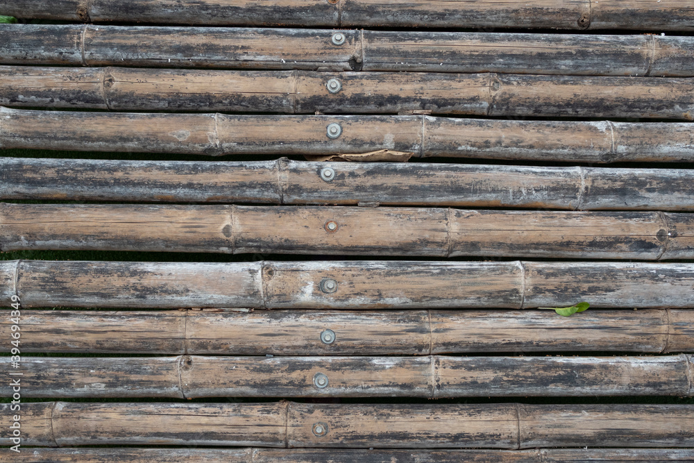 Old bamboo texture arrange in horizontal pattern for background.