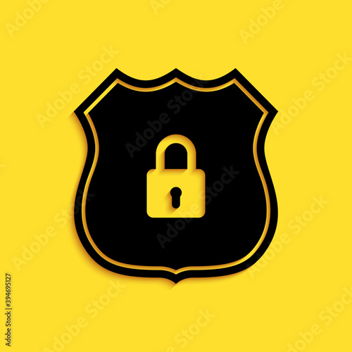 Black Shield security with lock icon isolated on yellow background. Protection, safety, password security. Firewall access privacy sign. Long shadow style. Vector.