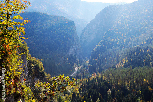 Abkhazia. The road to Ritsa lake in the fall. The road winds through sheer cliffs. photo