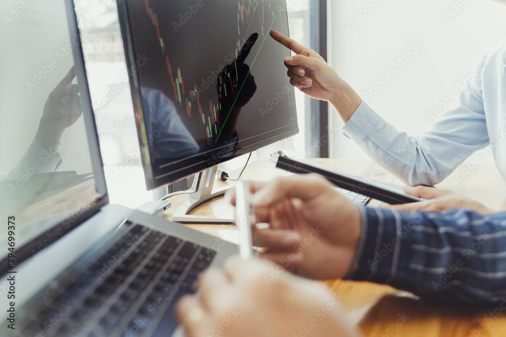 Investment concept, Investor calculating profits on stock market exchange.. Investment concept, Investor calculating profits on stock market exchange..