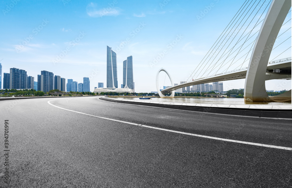 Fototapeta premium Expressway background and city scenery in Nanjing, China
