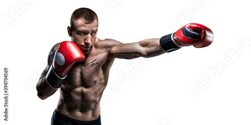 Professional boxer in red gloves exercises punches on a white background. Boxing concept. photo