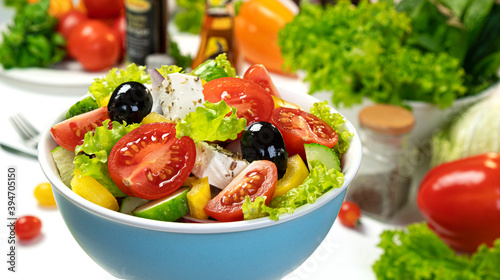 Fresh greek salad served with healthy food ingredients