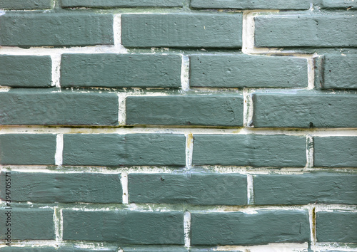 Green textured brick wall background