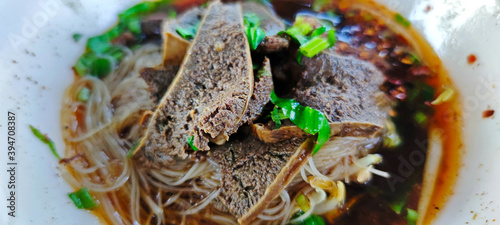 Spicy rice noodles with braised beef spleen soup.