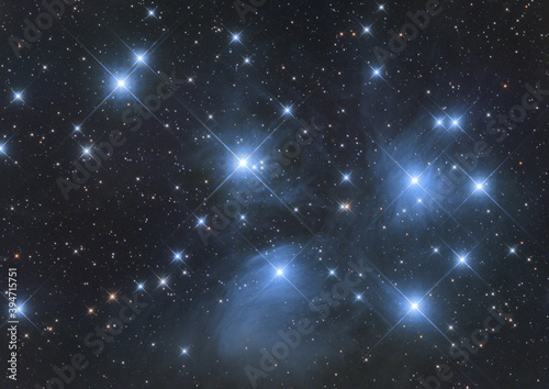 Closeup of Messier 45, called also Pleiades or Seven Sisters, its an open cluster in Taurus constellation and its reflection nebula, taken with my telescope.