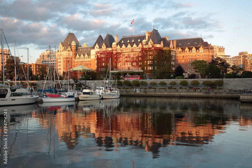 View of Victoria Harbor with sailing boats and yachts under Sunset in Vancouver island, BC, Canada