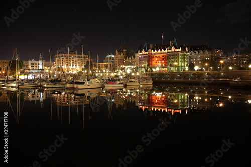 View of Victoria Harbor with sailing boats and yachts during night in Vancouver island, BC, Canada