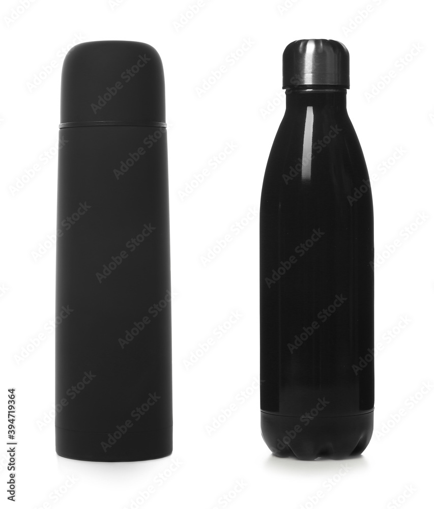 Modern thermos and bottle isolated on white Modern thermos and bottle isolated on white