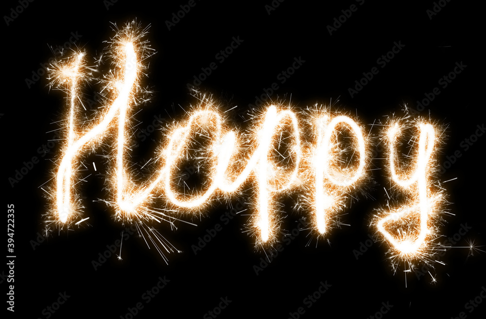 The inscription Happy on a black background with sparklers using a simulated long exposure The inscription Happy on a black background with sparklers using a simulated long exposure