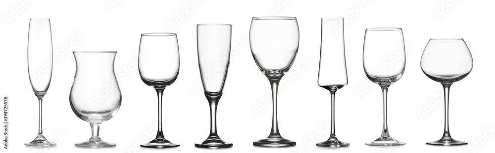 Different empty glasses on white background Different empty glasses on white background