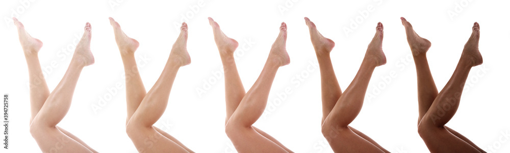 Legs of beautiful young woman on white background - obrazy, fototapety, plakaty 