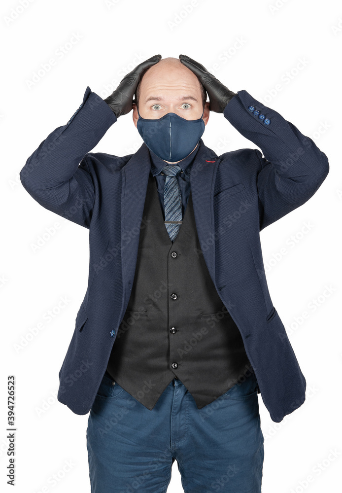 Surprised or scared business man with surgical medical virus protection mask and black gloves isolated. Surprised or scared business man with surgical medical virus protection mask and black gloves isolated.