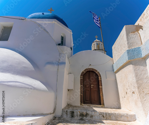 A white-painted church in the village of Pyrgos, Santorini in summertime