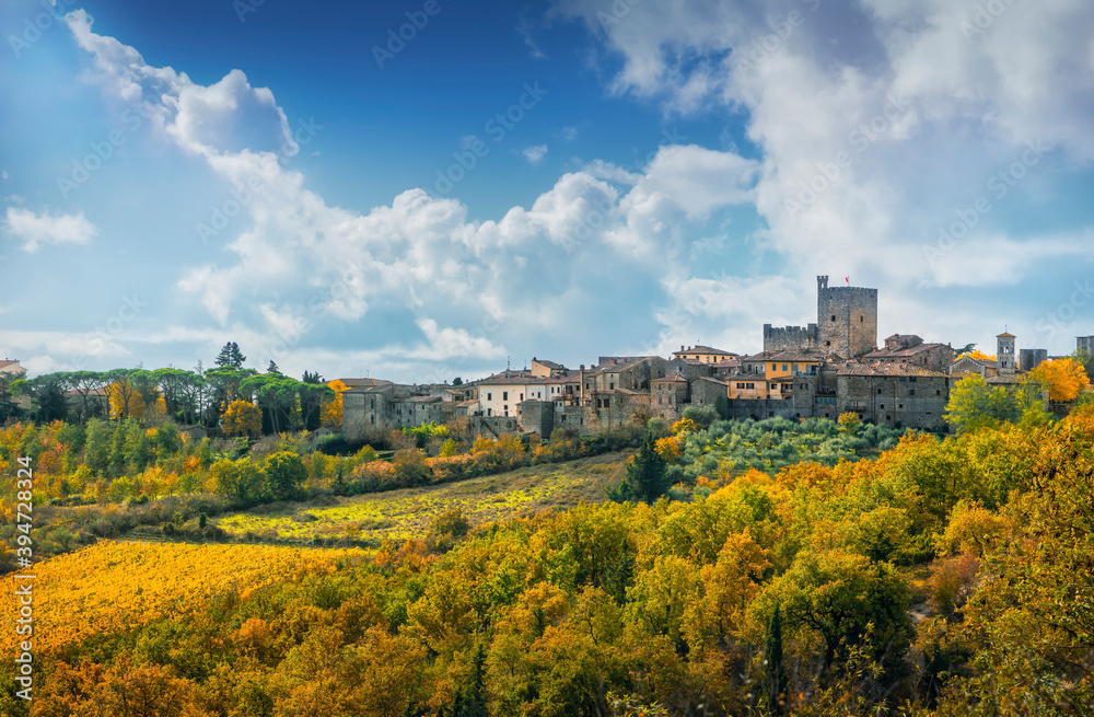 Fototapeta premium Castellina in Chianti village and autumn foliage. Tuscany, Italy
