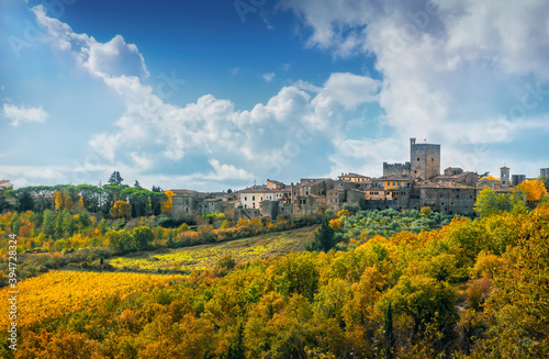 Castellina in Chianti village and autumn foliage. Tuscany, Italy